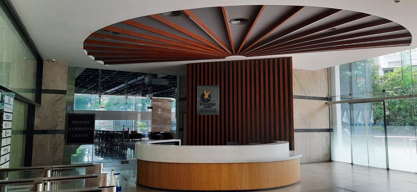 Reception fit-out with backlit signage and timber panelling